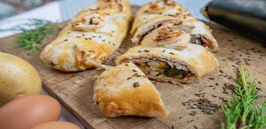 Lunch or dinner and cooking demo at a local home in Trento