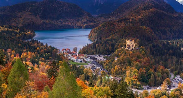 photo of view ofHohenschwangau Castle View from Neuschwanstein Castle 19th Century Neo-Romanesque Neo-Gothic Style Palace at Schwangau Füssen Ostallgäu Bavaria Germany Europe