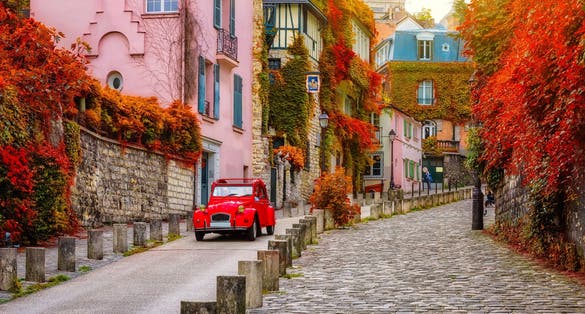 Cozy street in quarter Montmartre in Paris, France.