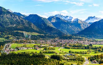 photo of aerial panoramic view of Oberstorf in Winter with snow in Bavaria, Germany.