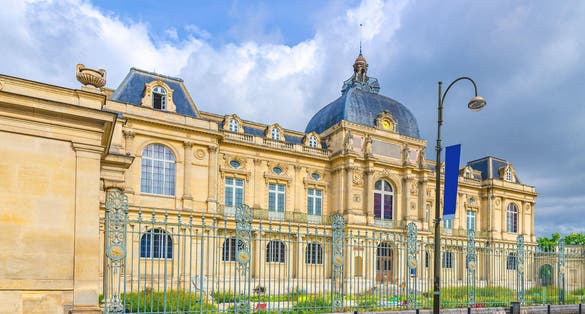 The Picardy Museum Musee de Picardie Second Empire style eclectic architecture style building in Amiens old historical city centre, blue sky background, Somme department, Hauts-de-France Region
