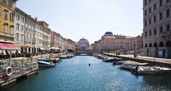 photo of view of The Grand Canal of Trieste is a navigable canal located in the heart of Borgo Teresiano, Trieste, Italy.