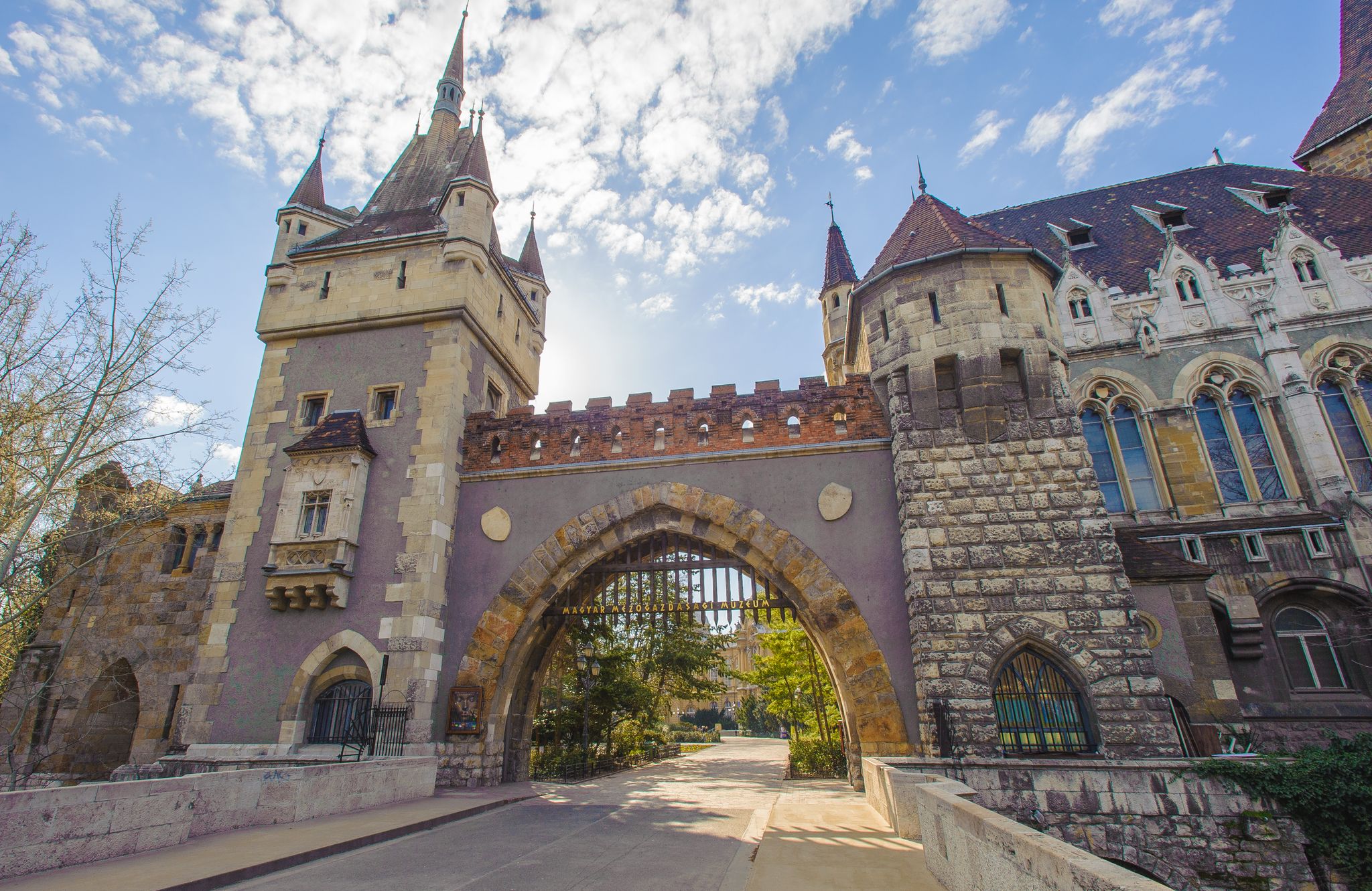 Photo of Vajdahunyad Castle, castle contains parts of buildings from various time periods, it displays different architectural styles: Romanesque, Gothic, Renaissance and Baroque.