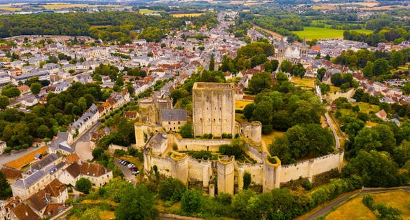 Flight over the city Loches and the Royal castle Loches on summer day. France