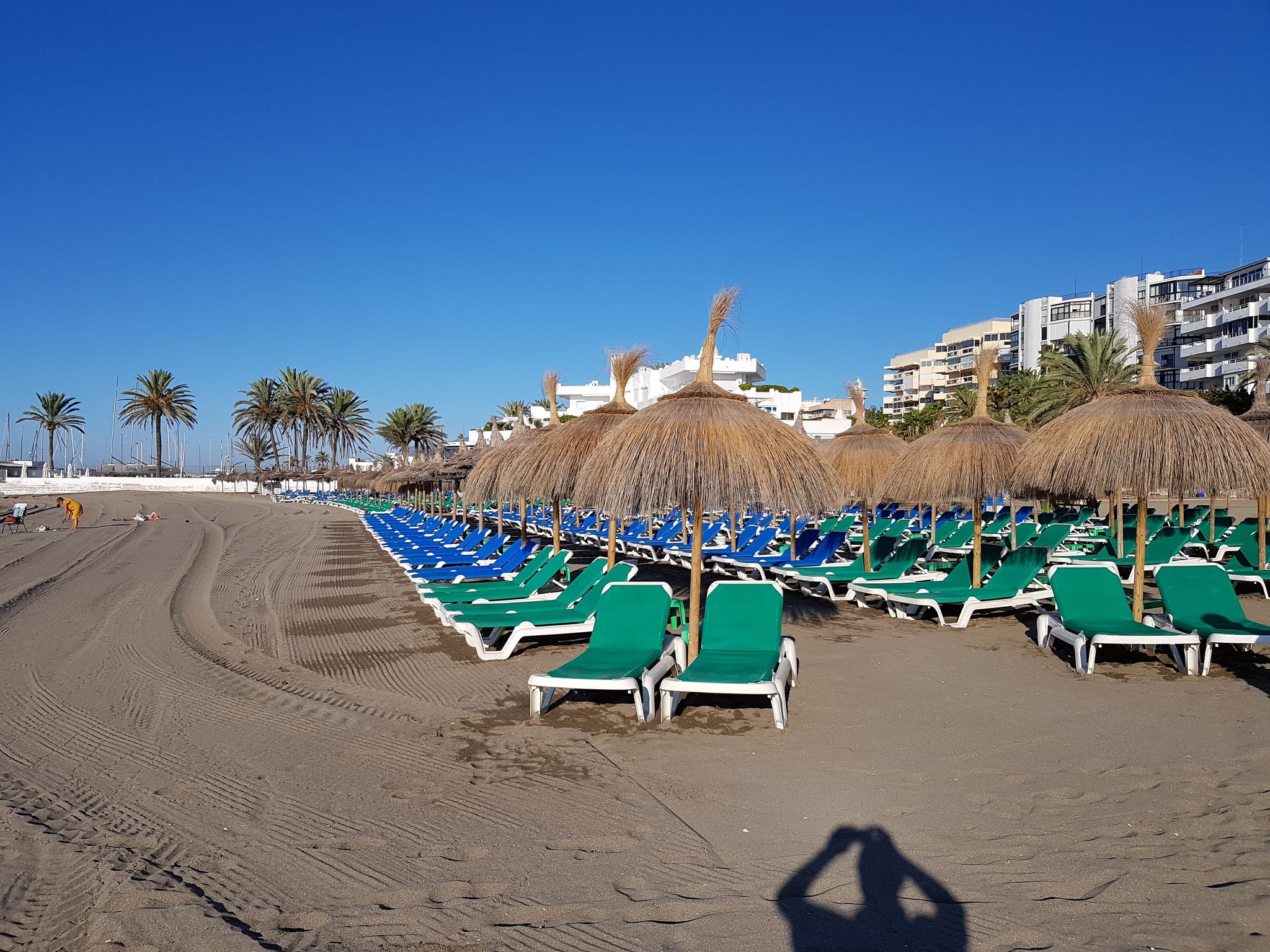 Photo of The beach next to the Avenida del Mar walkway in Marbella. Marbella is one of the most important tourist resorts on the Costa del Sol, in southern Spain .