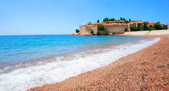 Photo of beautiful Sveti Stefan beach, Budva, Montenegro.