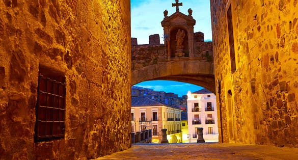 Photo of Caceres Arco de la Estrella Star arch in Spain entrance to monumental city .