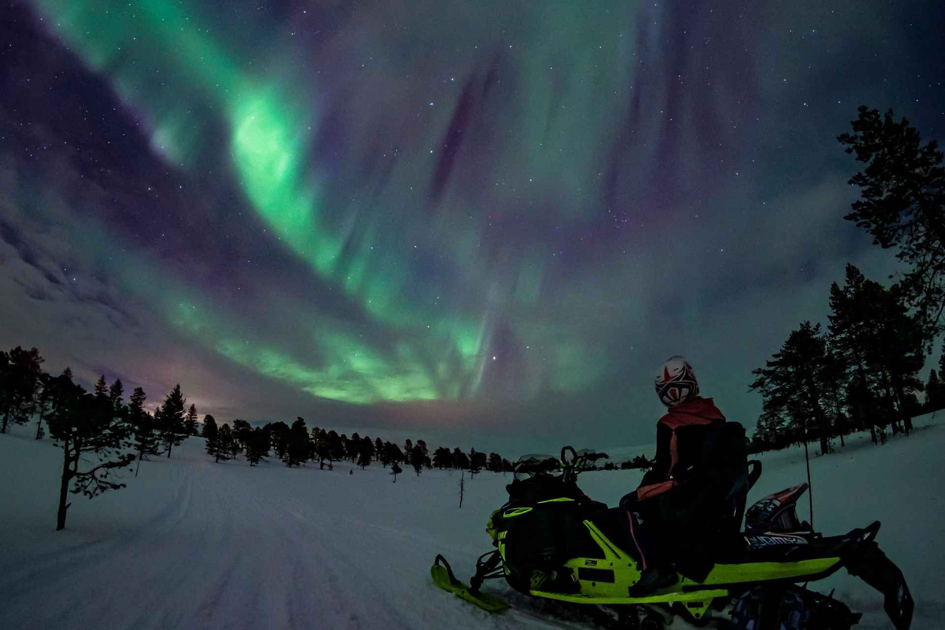 Arctic Adventure: Northern Lights Hunting with Snowmobiles