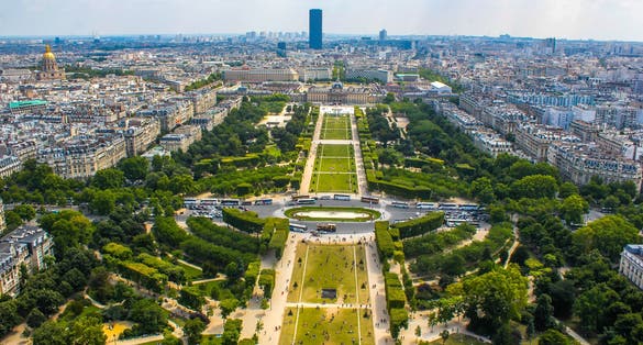 Photo of Champ de Mars view from top of Eiffel tower looking down see the entire city as a beautiful classic architecture, France.