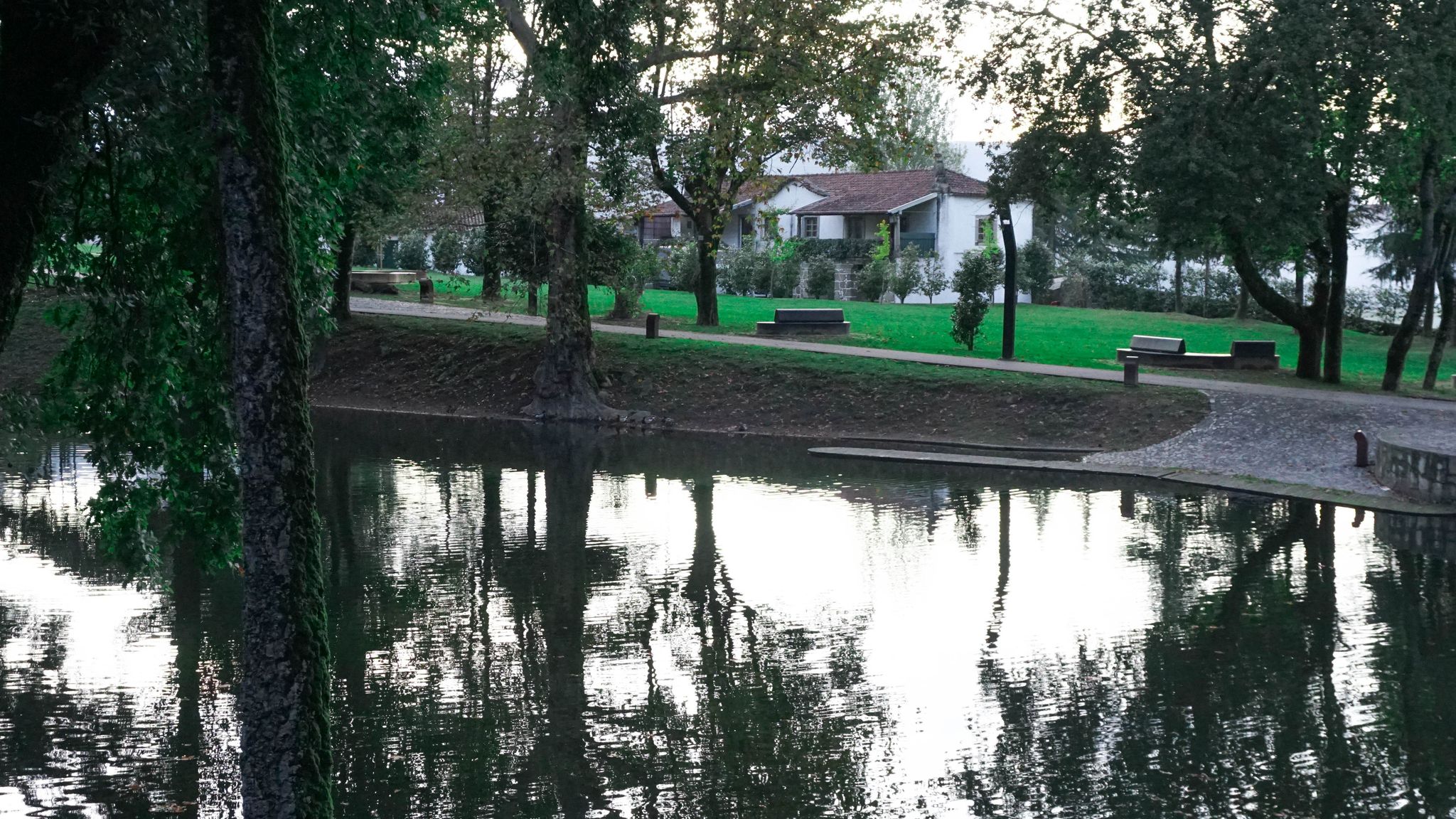Garden and lake from bridge park in Braga, PortugaL
