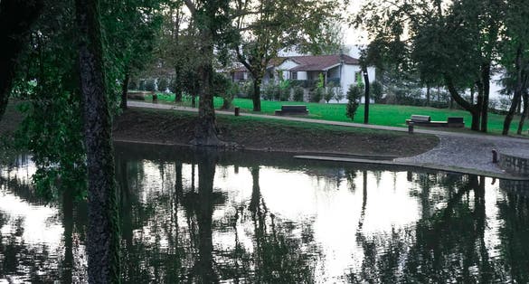 Garden and lake from bridge park in Braga, PortugaL