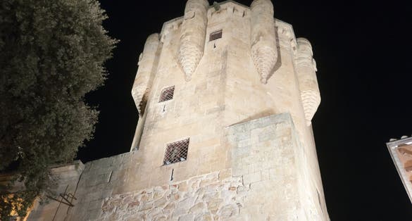 Photo of Clavero Tower in Salamanca, Spain, by night .