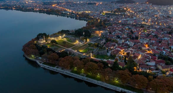 Photo of panoramic aerial view of the town and the Pamvotis lake, Ioannina in Greece.