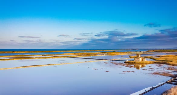photo of view of Beaituful aerial sunset view over the Pomorie Salt Ponds in Bulgaria.