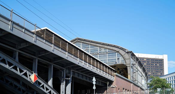 The historic train station Friedrichstrasse in Berlin also called the Palace of Tears seen from the river Spree.