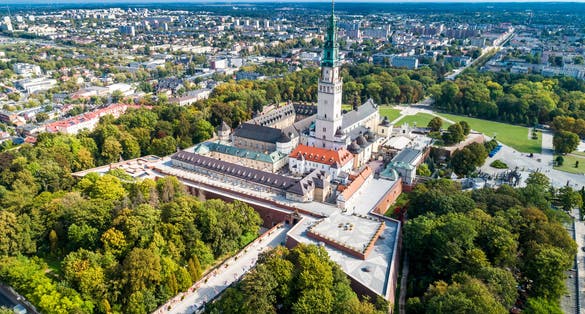 Photo of aerial view of Jasna Góra fortified monastery and church on the hill. Famous historic place and Polish Catholic pilgrimage site with Black Madonna miraculous icon, Czestochowa, Poland.