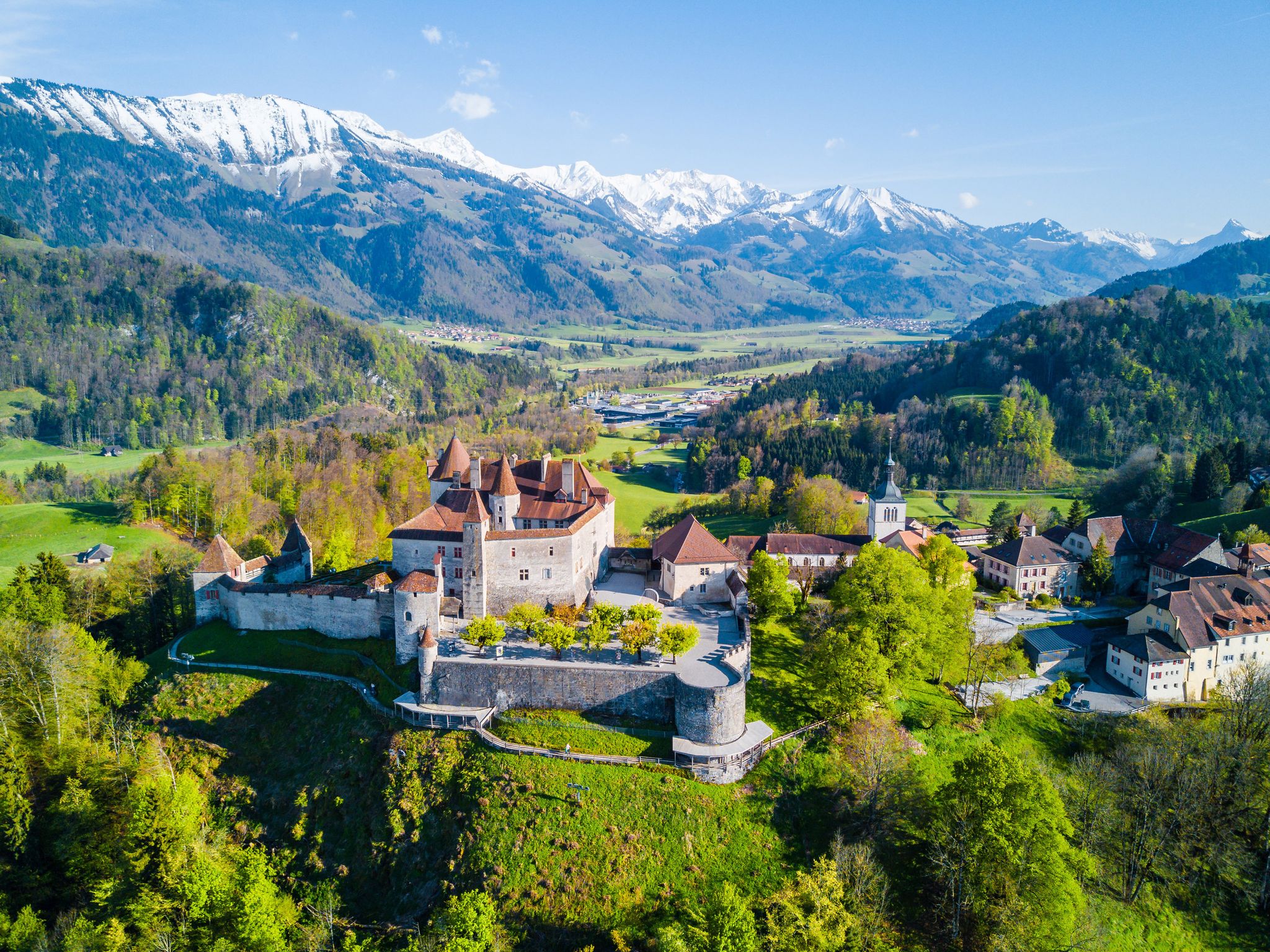 Photo of aerial View of the Medieval Town of Gruyeres, Famous Castle of Gruyeres, Canton of Fribourg, Switzerland.