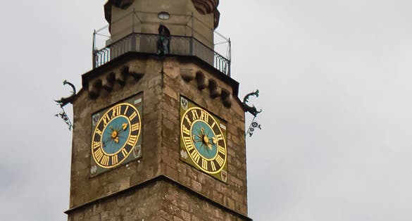 photo of view of Vertical view of Stadtturm (city tower) in old town of Innsbruck Austria.