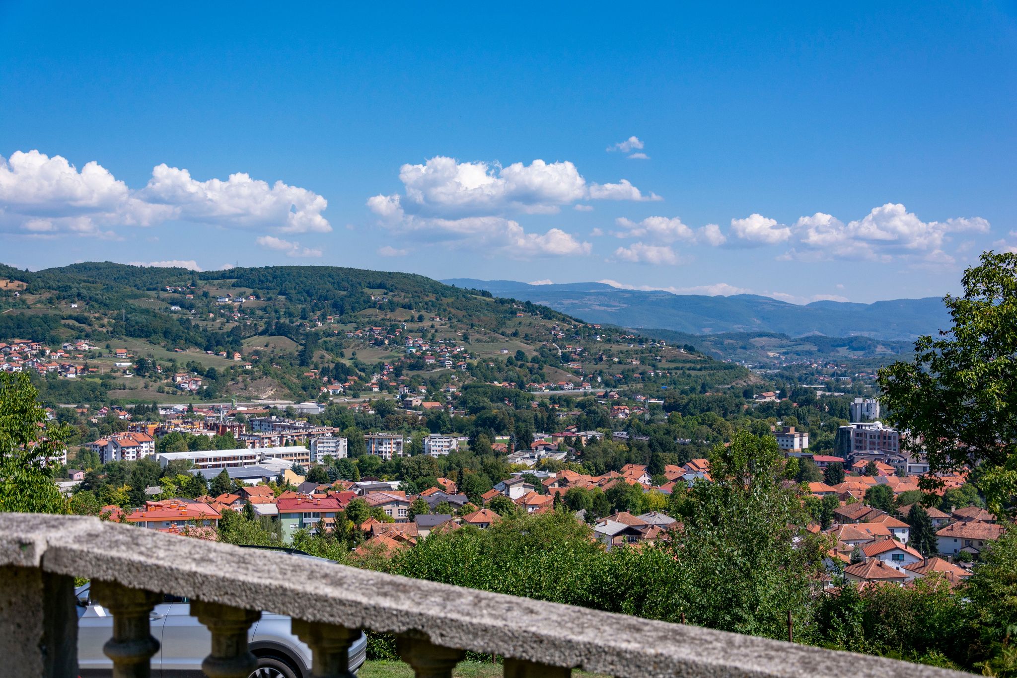 Photo of beautiful aerial view from uphill towards the town of Visoko in Bosnia and Herzegovina.