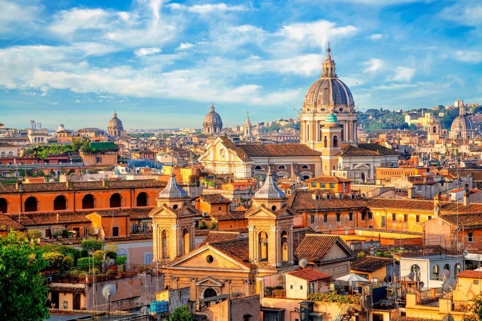 Aerial panoramic cityscape of Rome, Italy, Europe. Roma is the capital of Italy. Cityscape of Rome in summer. Rome roofs view with ancient architecture in Italy. 