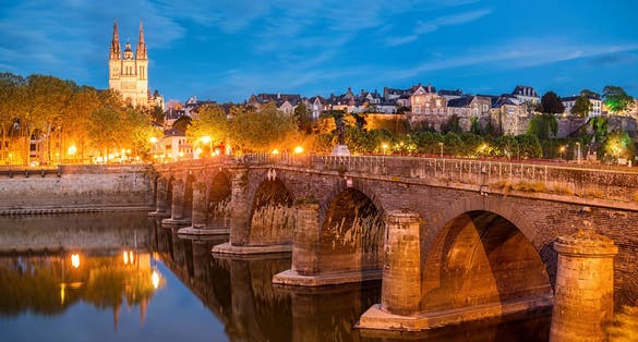 photo  of view of Verdun Bridge, Angers Cathedral , river Men in Angers, France - blue hour.