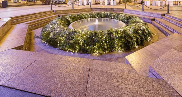Photo of Mandusevac fountain at night, decorated with advent wreath. Zagreb Central Square of Ban Josip Jelacic, Croatia.