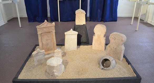 photo of view Verschiedene antike Grabsteine, Mytilene, Greece.