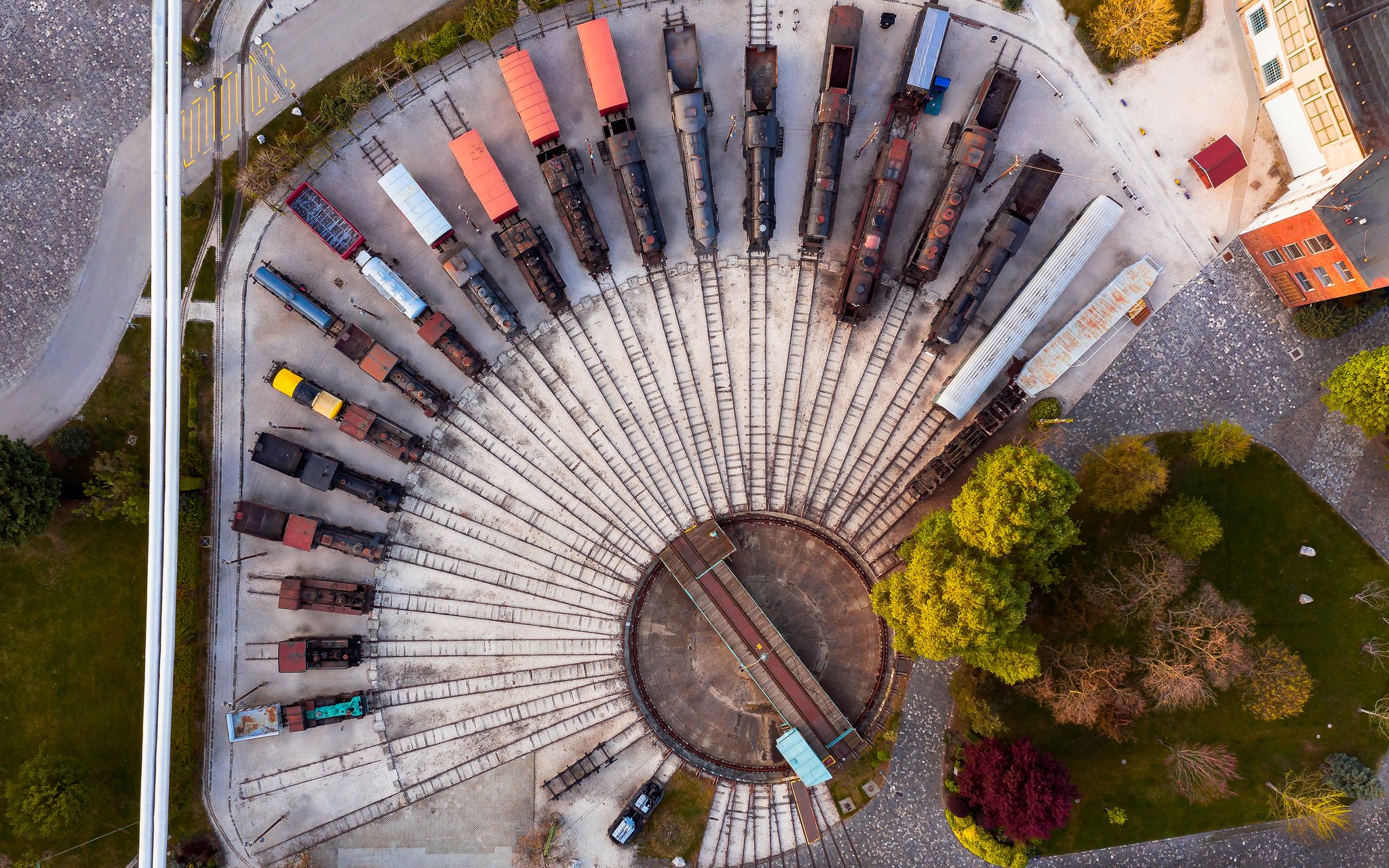 photo of Europe hungary Budapest. Old train cemetery and museum. Aerial photos about an abandoned place. There are much old rust train.