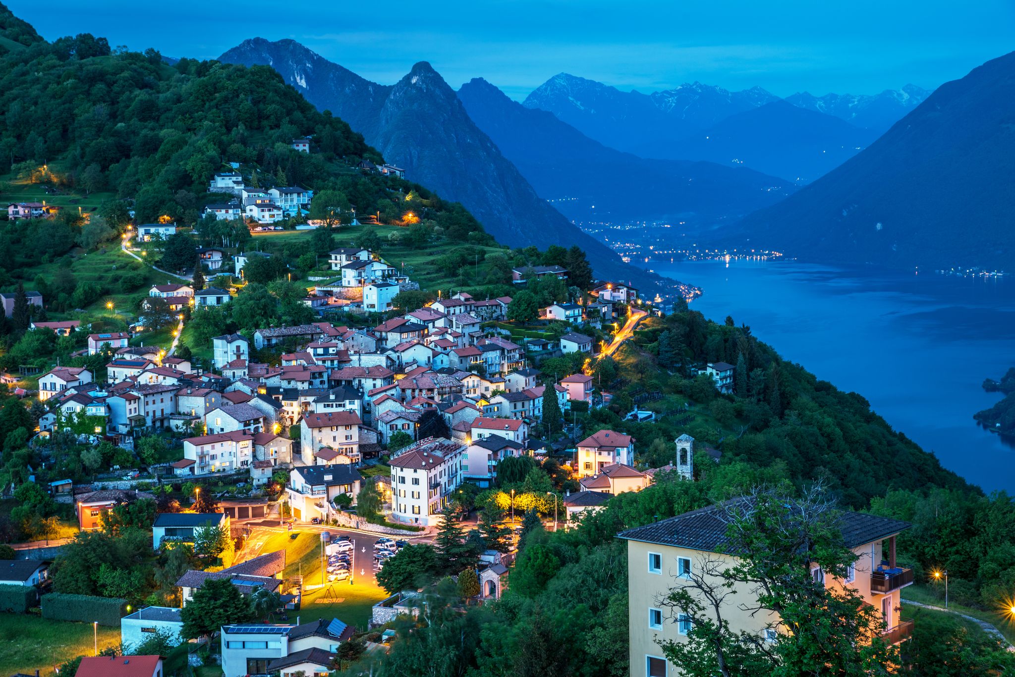 photo of Village of Brè. Switzerland, May 11, 2018.Night view from Monte Brè Mountain.