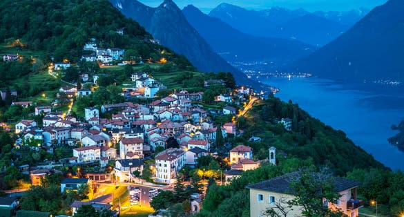 photo of Village of Brè. Switzerland, May 11, 2018.Night view from Monte Brè Mountain.