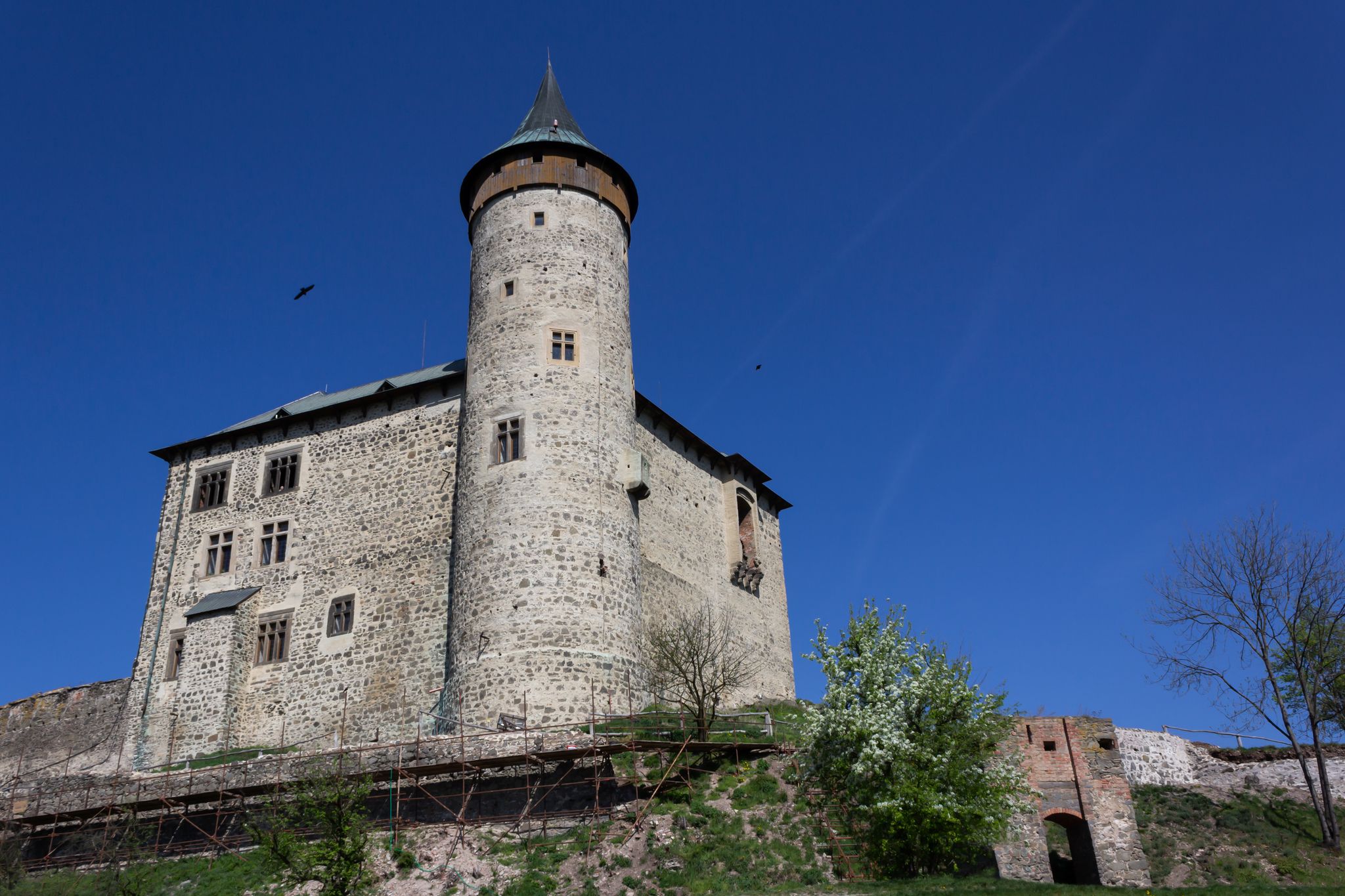 Photo of aerial view of Kunetice Mountain Castle, Raby, Czech republic.