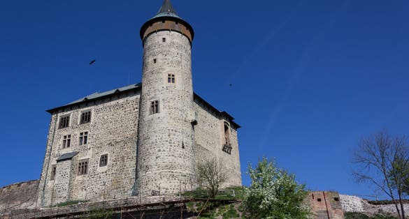 Photo of aerial view of Kunetice Mountain Castle, Raby, Czech republic.