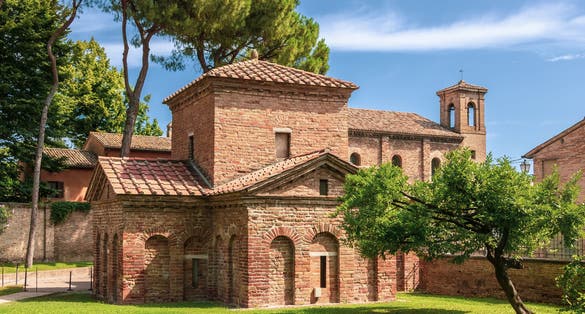 photo of view of High dynamic range (HDR) Galla Placidia mausoleum and St Vitale church, Ravenna, Italy.