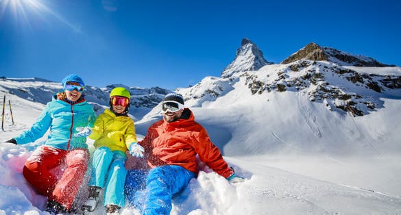 photo of ski, winter, snow - family enjoying winter vacation in Zermatt, Switzerland.