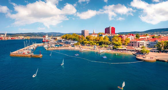 Small yachts on Koper port. Aerial outdoor scene of Adriatic coastline, Slovenia, Europe. Beautiful Mediterranean seascape. Vacation concept background.
