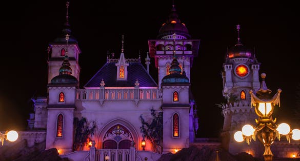 Photo of the Efteling theme park with decorations at night in the Netherlands.