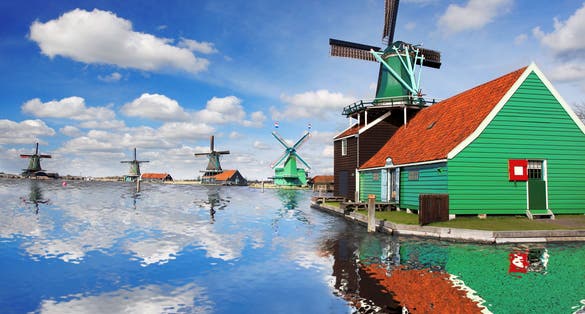 Traditional Dutch windmills with canal close the Amsterdam, Holland