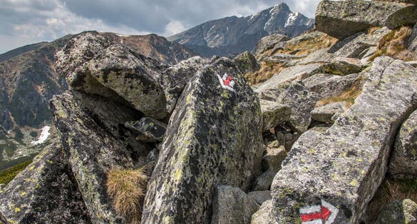 Photo of trail in the mountains - tourist signs to Predné Solisko - Slovakia, High Tatras .