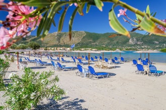 Picturesque sandy beach in Alykanas full of beautiful flowers and plants situated on the east coast of Zakynthos island, Greece.