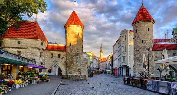 Photo of Twin towers of Viru Gate at the entrance to the old town of Tallinn.