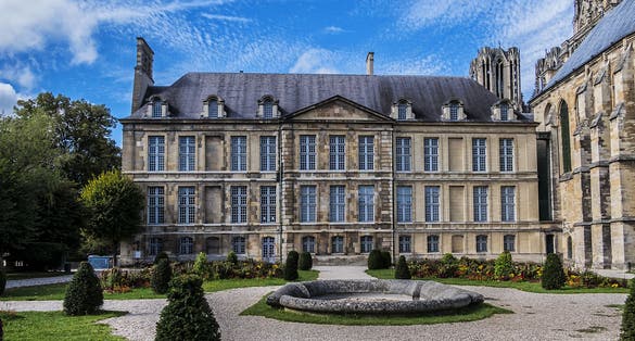 Mediaeval Palace of Tau (Palais du Tau) and palace chapel (on right) in Reims. It was bishop palace and subsequently an archbishop palace. Reims, Champagne-ardenne, France.