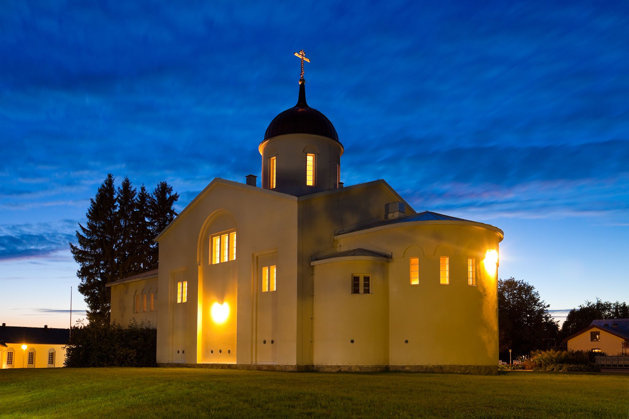 Photo of the main church of the New Valamo Orthodox monastery at night in Heinavesi, Finland.