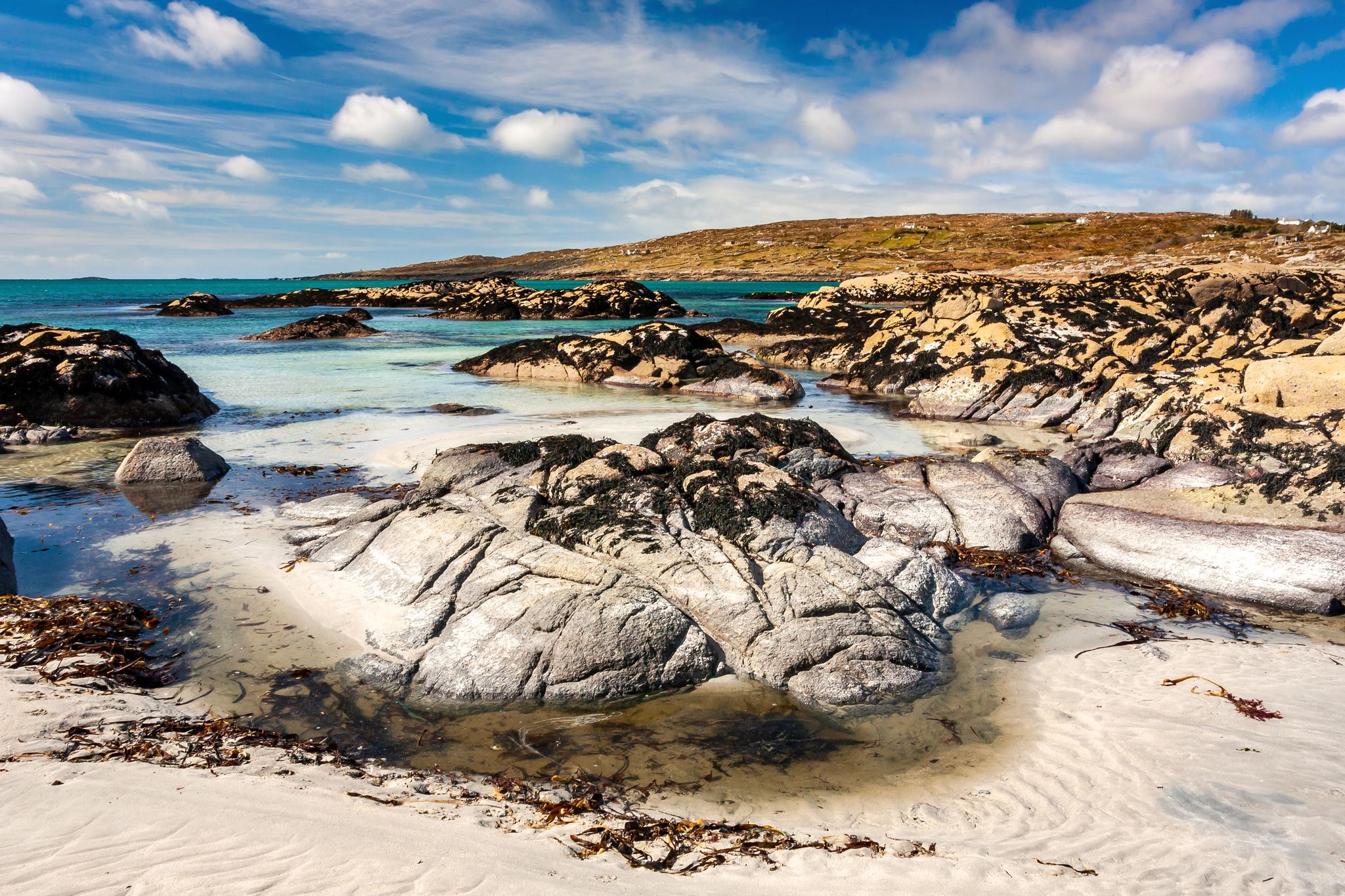 photo of view of Scenic coastline of Dog's Bay in Roundstone, Ireland.