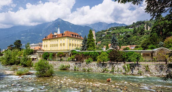 Merano (Italy) - Merano Winterpromenade along the torrente Passirio. Its most distinctive landmark is the Wandelhalle covered passageway.