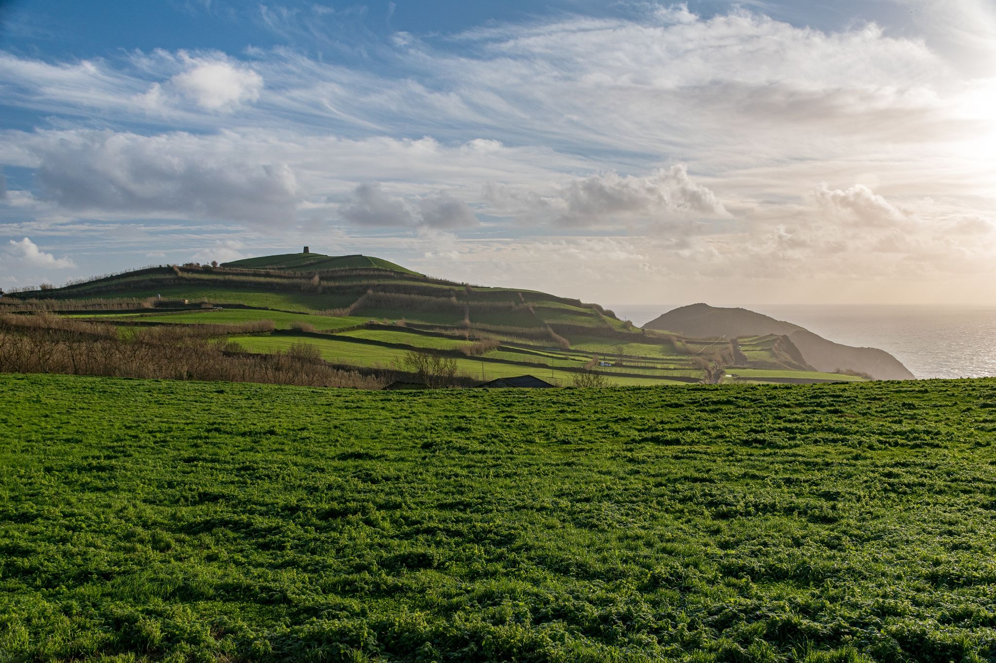 Photo of Panoramic view from the Miradouro da Ponta do Escalvado at the sunset, in the Sao Miguel island. Azores, Portugal.