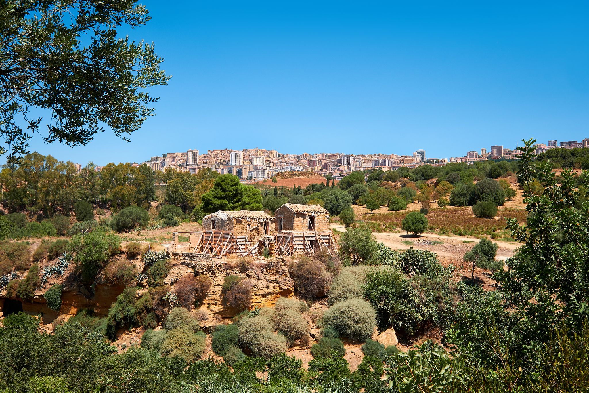 Farm houses in Kolymbethra Gardens, or Jardino della Kolymbethra. magnificent green garden in the heart of the Valley of Temples, Agrigento, Sicily, Italy.