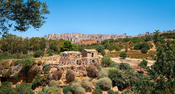 Farm houses in Kolymbethra Gardens, or Jardino della Kolymbethra. magnificent green garden in the heart of the Valley of Temples, Agrigento, Sicily, Italy.