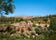 Farm houses in Kolymbethra Gardens, or Jardino della Kolymbethra. magnificent green garden in the heart of the Valley of Temples, Agrigento, Sicily, Italy.
