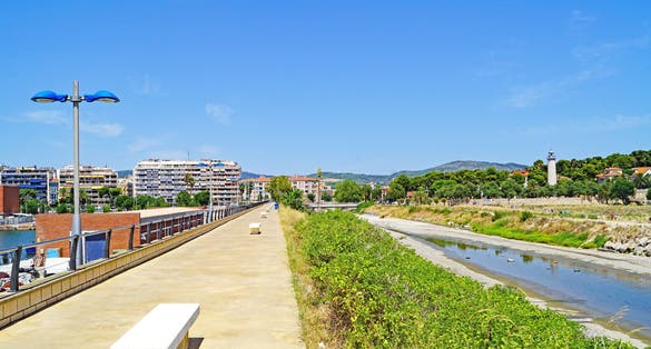 Photo of Port and lighthouse of Sant Cristofol in Vilanova i la Geltru in Barcelona, Catalunya, Spain.