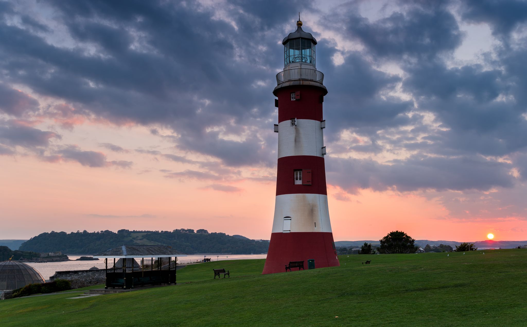 Photo of Smeaton's Tower Lighthouse at sunset built by John Smeaton overlooking Plymouth Hoe, UK.